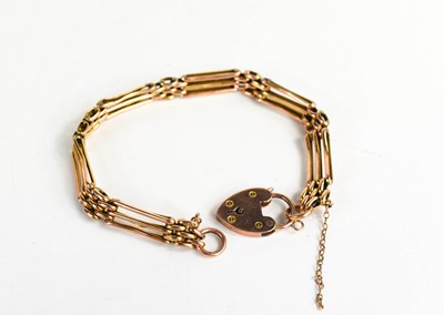 Lot 241 - A 9ct rose gold gate link bracelet with a 9ct...