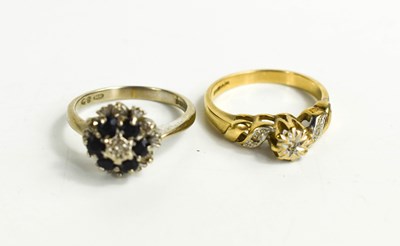 Lot 296 - Two 9ct gold rings; one of cluster form set...