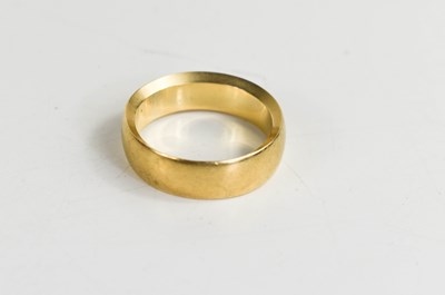 Lot 228 - A 9ct gold wedding band, size Q/R, 7.1g.