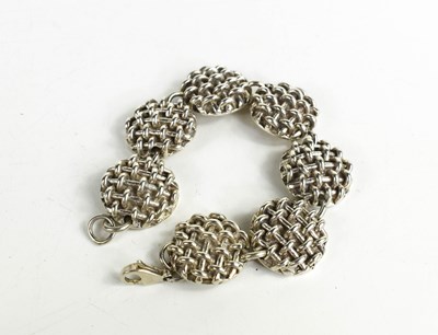 Lot 145 - A silver bracelet by Kate Naylor High,...