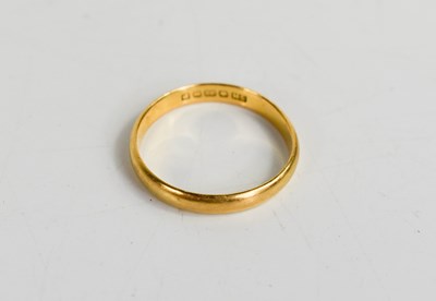 Lot 318 - A 22ct gold wedding band, size N, 2.44g.