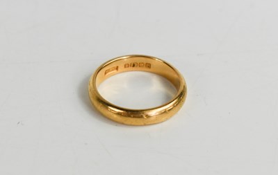 Lot 109 - A 22ct gold wedding band, size M, 5.68g.