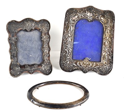 Lot 27 - An Edwardian silver ornate photo frame with...