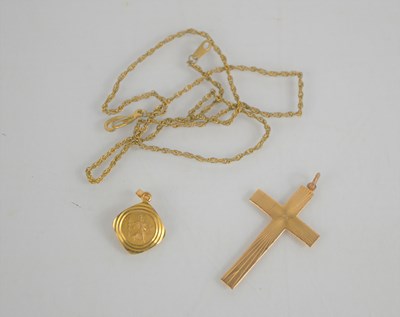 Lot 242 - A 9ct gold crucifix pendant and a 9ct gold St...