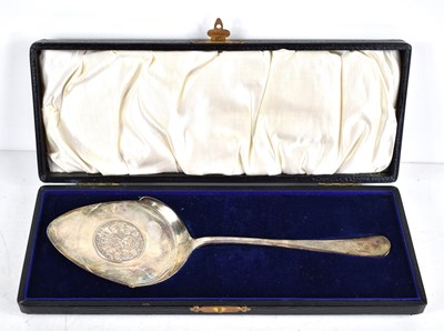 Lot 28 - A silver commemorative cake slice set with a...