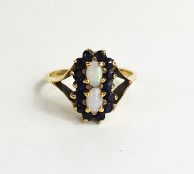 Lot 197 - A 9ct gold, opal and sapphire ring, the two...