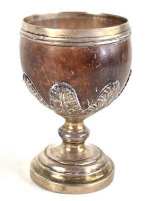 Lot 4 - A George IV silver mounted coconut cup,...