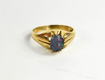 Lot 181 - A 9ct gold and opal ring, circa 1970, the oval...