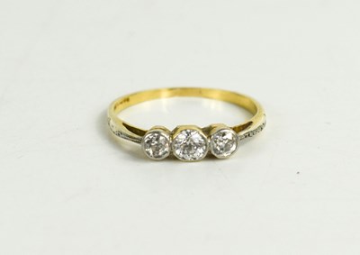 Lot 319 - An 18ct gold and diamond three stone ring, old...