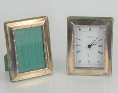 Lot 273 - A Harrods desk clock with silver frame...