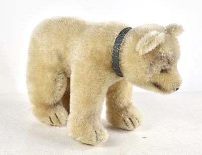 Lot 347 - A small Steiff polar bear, glass eyes, felt...