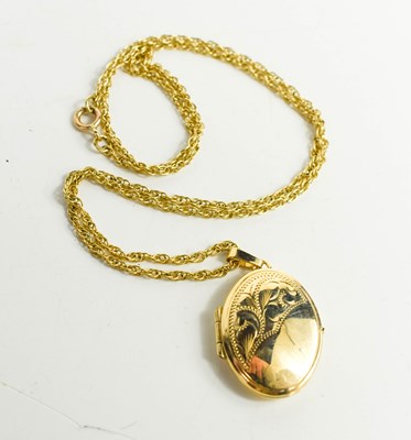 Lot 187 - A 9ct gold oval locket pendant necklace, the...