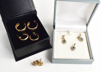 Lot 77 - Two pairs of 9ct gold hoop earrings, a pair of...