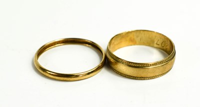 Lot 212 - A 9ct gold wedding band, size M, and a gold...