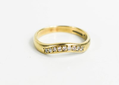 Lot 288 - A 9ct gold and diamond ring, with nine...