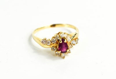 Lot 83 - A 14ct gold, ruby and diamond ring, the pear...