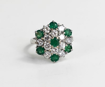 Lot 227 - An 18ct white gold, diamond and emerald...