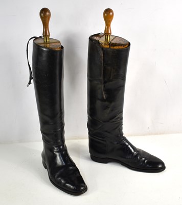 Lot 322 - A pair of early 20th century black leather...