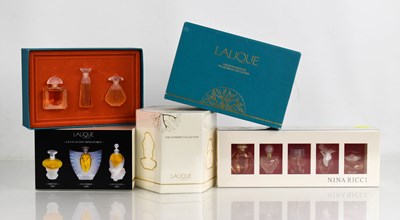 Lot 318 - A collection of Lalique scent bottles, sealed...