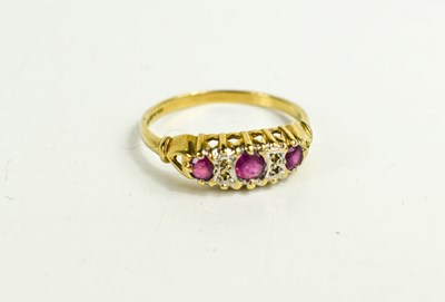 Lot 337 - A 9ct gold and pink sapphire ring, the three...