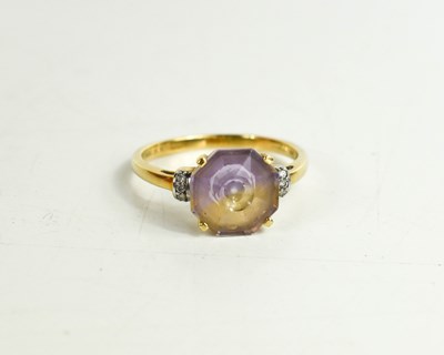 Lot 160 - A 9ct gold and ametrine ring, in four claw...