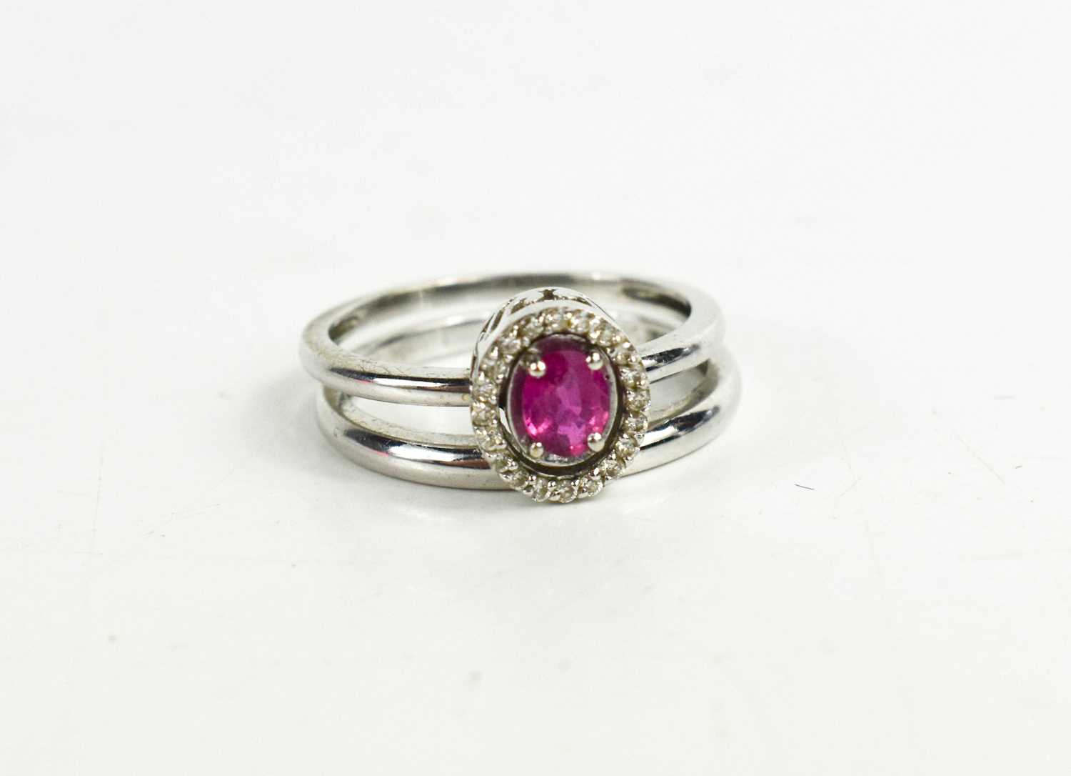 Lot 66 - A 14ct gold, diamond and ruby twin ring, can
