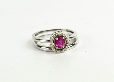 Lot 66 - A 14ct gold, diamond and ruby twin ring, can...