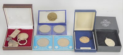 Lot 272 - A collection of silver medallions, pendants...