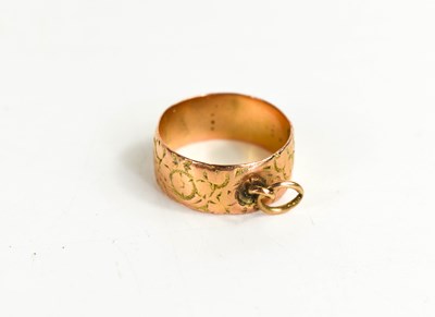 Lot 220 - A 9ct gold wedding band, engraved with...