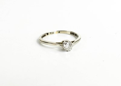 Lot 84 - An 18ct gold and diamond solitaire ring, the...