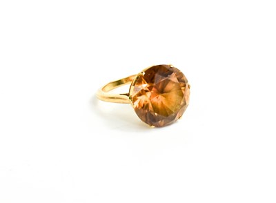 Lot 233 - A 9ct gold and citrine ring, the brilliant cut...