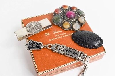 Lot 144 - A vintage silvered metal and gemstone set...