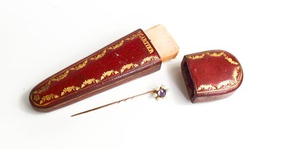 Lot 40 - A vintage Cartier pin box, containing a gold...