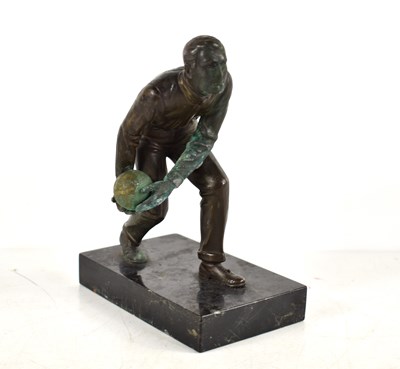 Lot 257 - An Art Deco bronze sculpture of a man bowling...