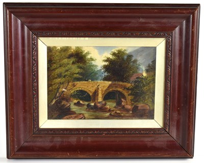 Lot 409 - A 19th century oil on canvas depicting a river...