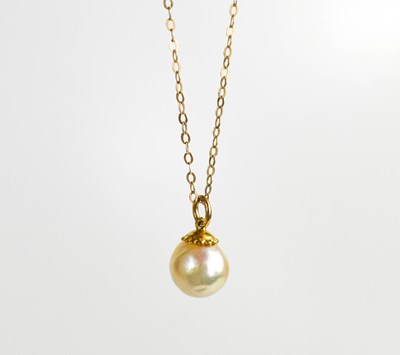 Lot 95 - A 9ct gold and pearl pendant necklace, the...