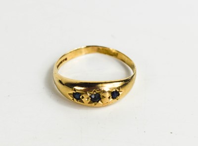 Lot 156 - A 9ct gold and sapphire gypsy ring, the...