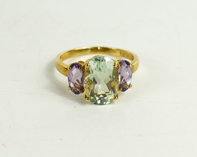 Lot 119 - A 9ct gold, prasiolite and amethyst ring, size...