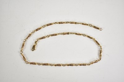 Lot 333 - A 9ct gold twist link necklace, with crab claw...