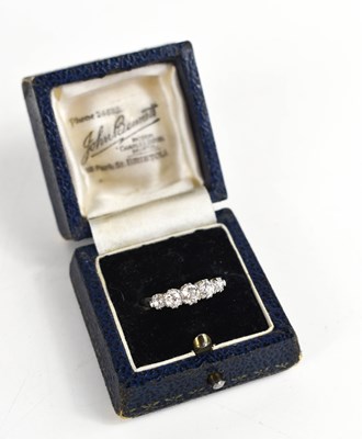 Lot 65 - A platinum and diamond five stone ring, the...