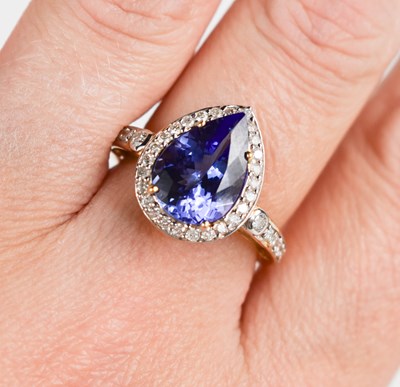 Lot 162 - An 18ct gold, tanzanite and diamond ring, the...