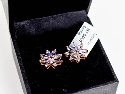 Lot 287 - A pair of 9ct gold and tanzanite stud earrings,...