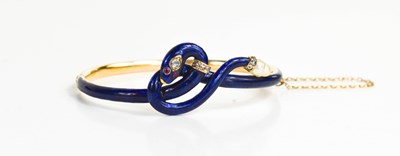 Lot 9 - A late 19th century gold, diamond, blue enamel...