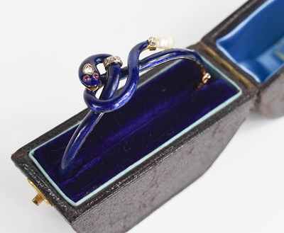 Lot 9 - A late 19th century gold, diamond, blue enamel...