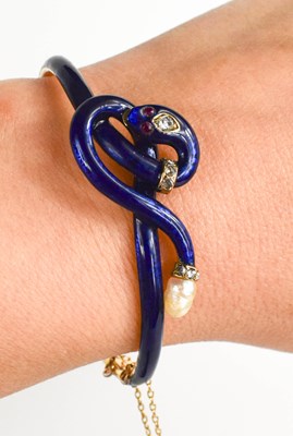 Lot 9 - A late 19th century gold, diamond, blue enamel...