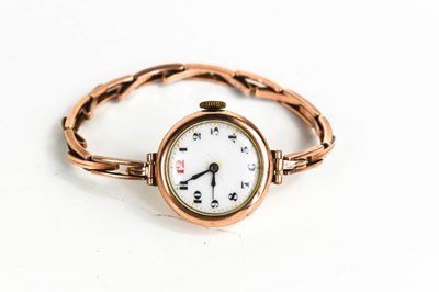 Lot 374 - A 1920s 9ct rose gold wristwatch, with an...