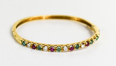 Lot 305 - An 18ct gold, diamond, emerald and pink...