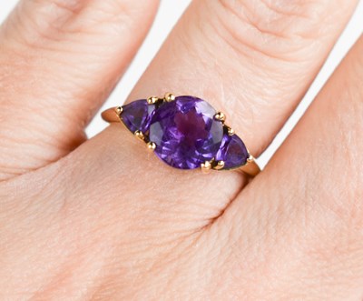 Lot 326 - A 9ct gold and amethyst ring, the central...