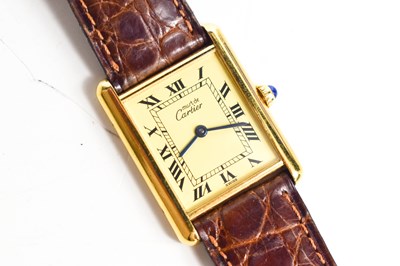 Lot 44 - A Must de Cartier Vermeil tank watch, silver...