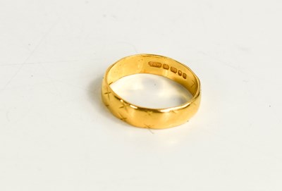 Lot 206 - A 22ct gold wedding band, size M, 2.95g.